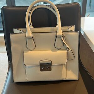 White leather Michael Kors purse with removable strap.